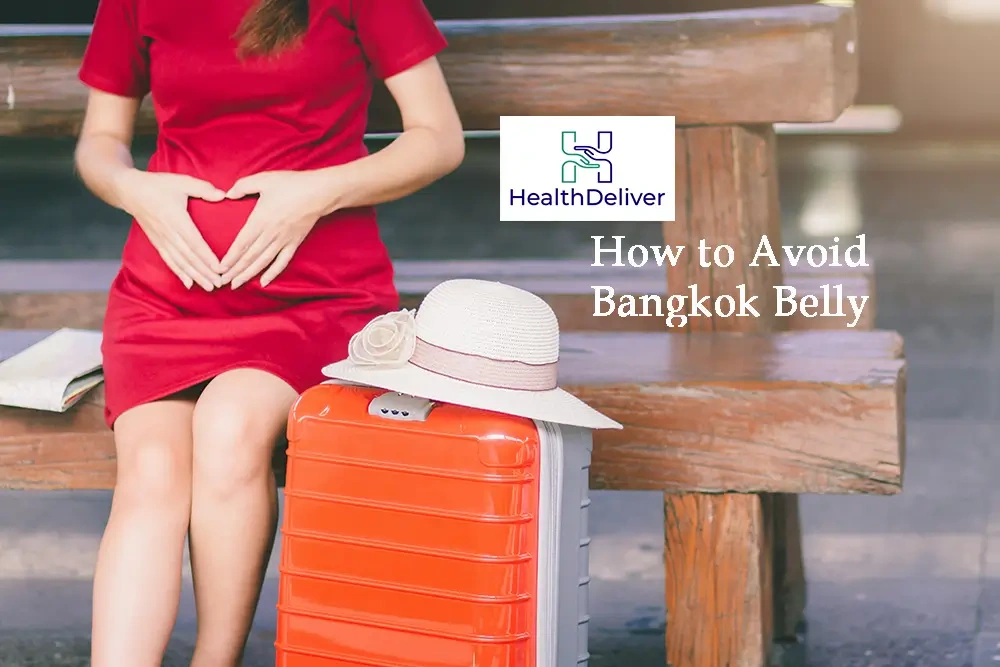 Pregnant woman in red dress holding belly with orange suitcase