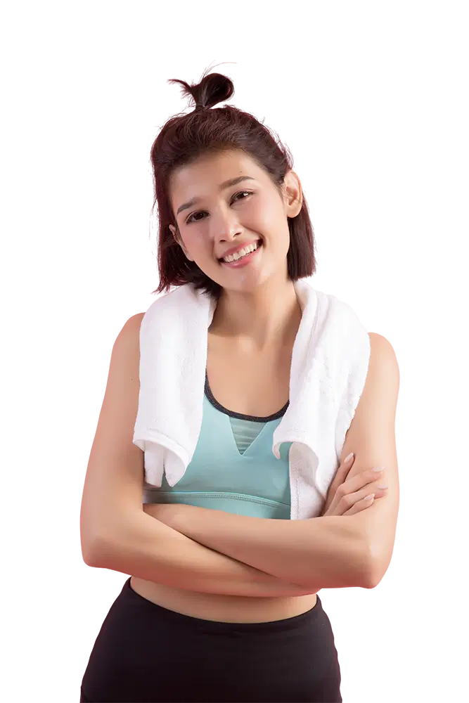 Young fit woman in sports bra smiling after workout exercise