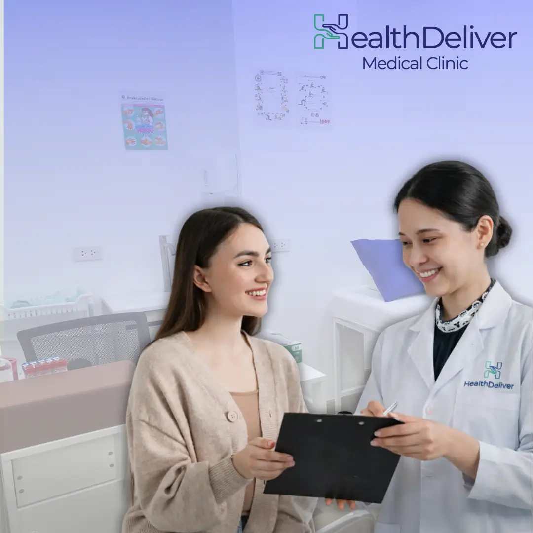 Healthcare provider consulting with patient holding tablet in medical clinic