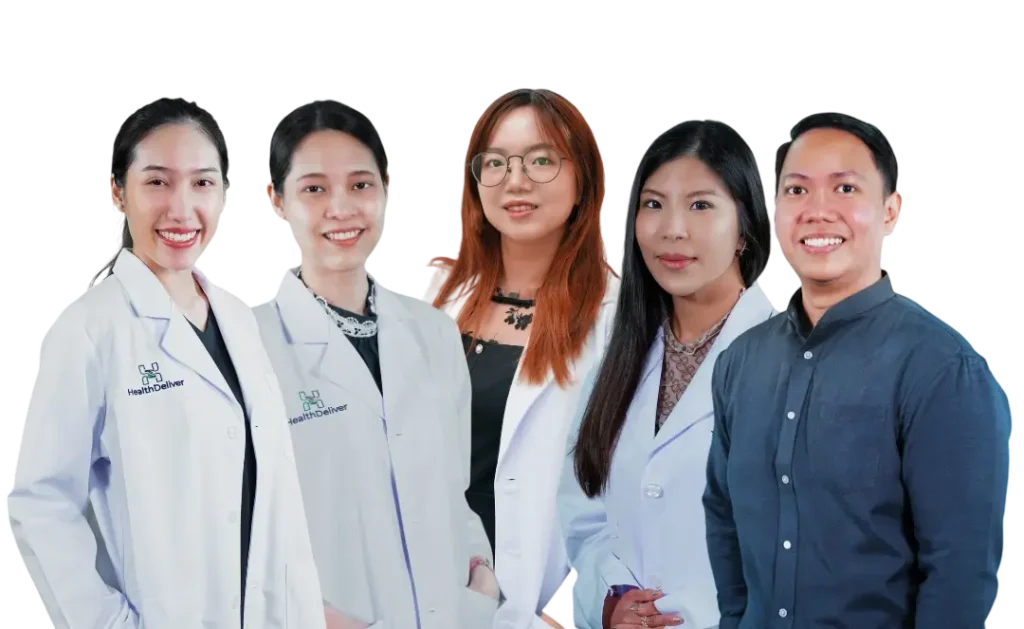 GP Referrals Professional healthcare team of five diverse medical professionals smiling together