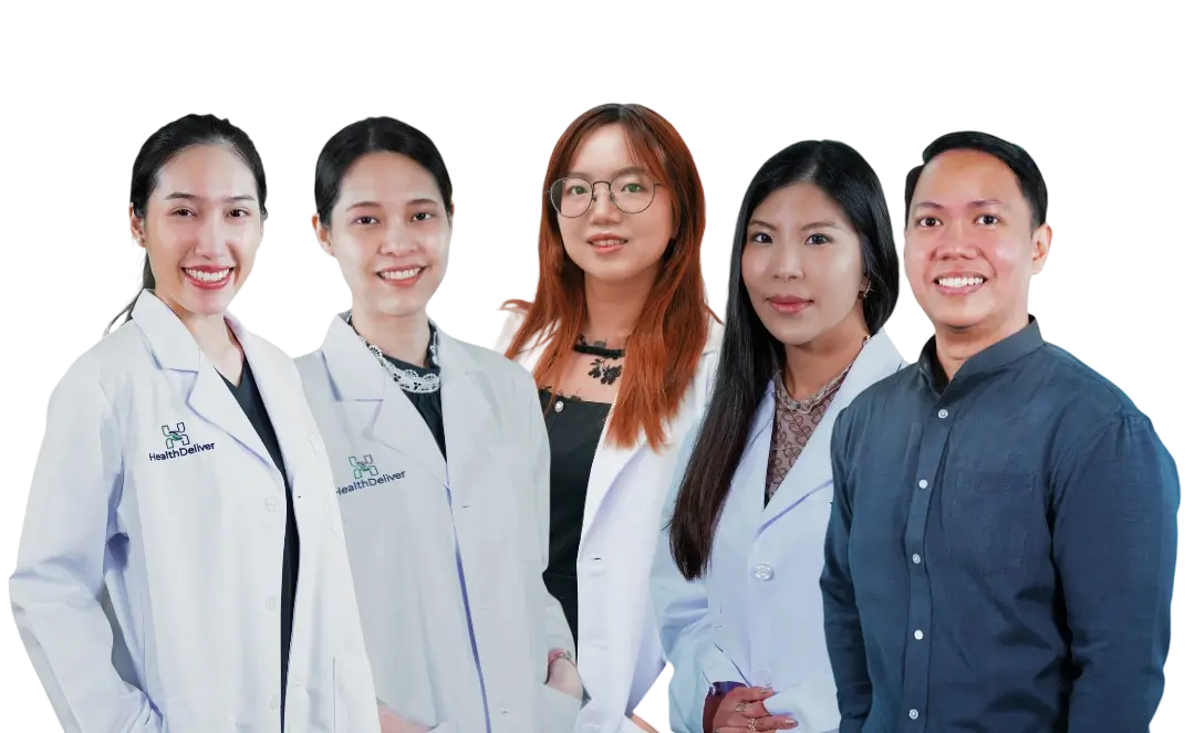 GP Referrals Professional healthcare team of five diverse medical professionals smiling together